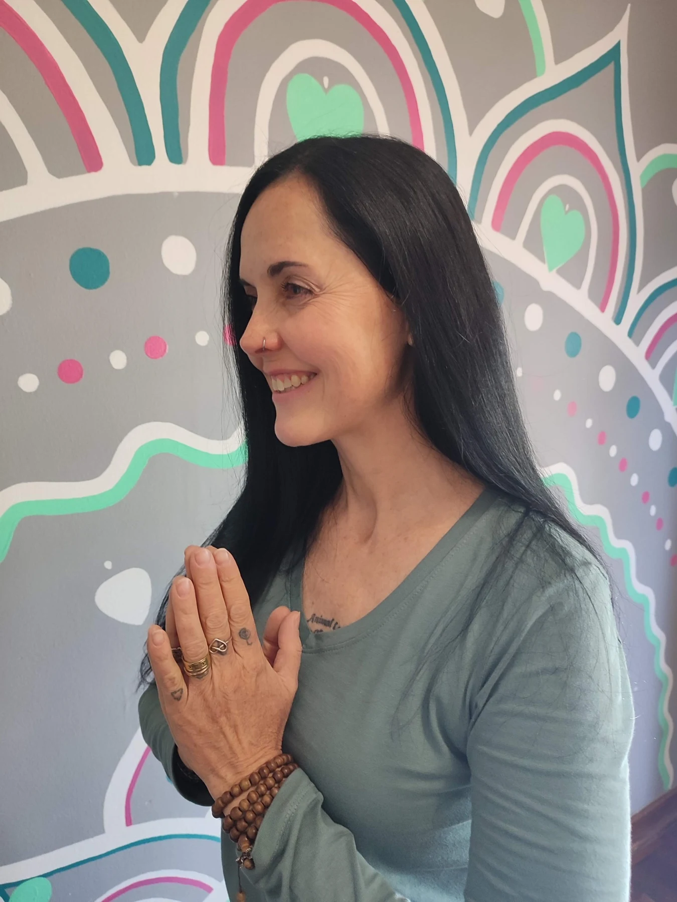 Michelle Karen Leicher with hands together in a moment of stillness